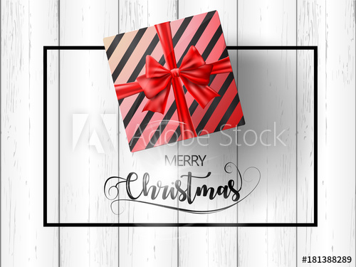 500x375 Merry Christmas Gift Box With Red Ribbon On White Wood Texture
