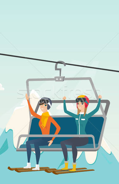 388x600 Two Caucasian Skiers Using Cableway