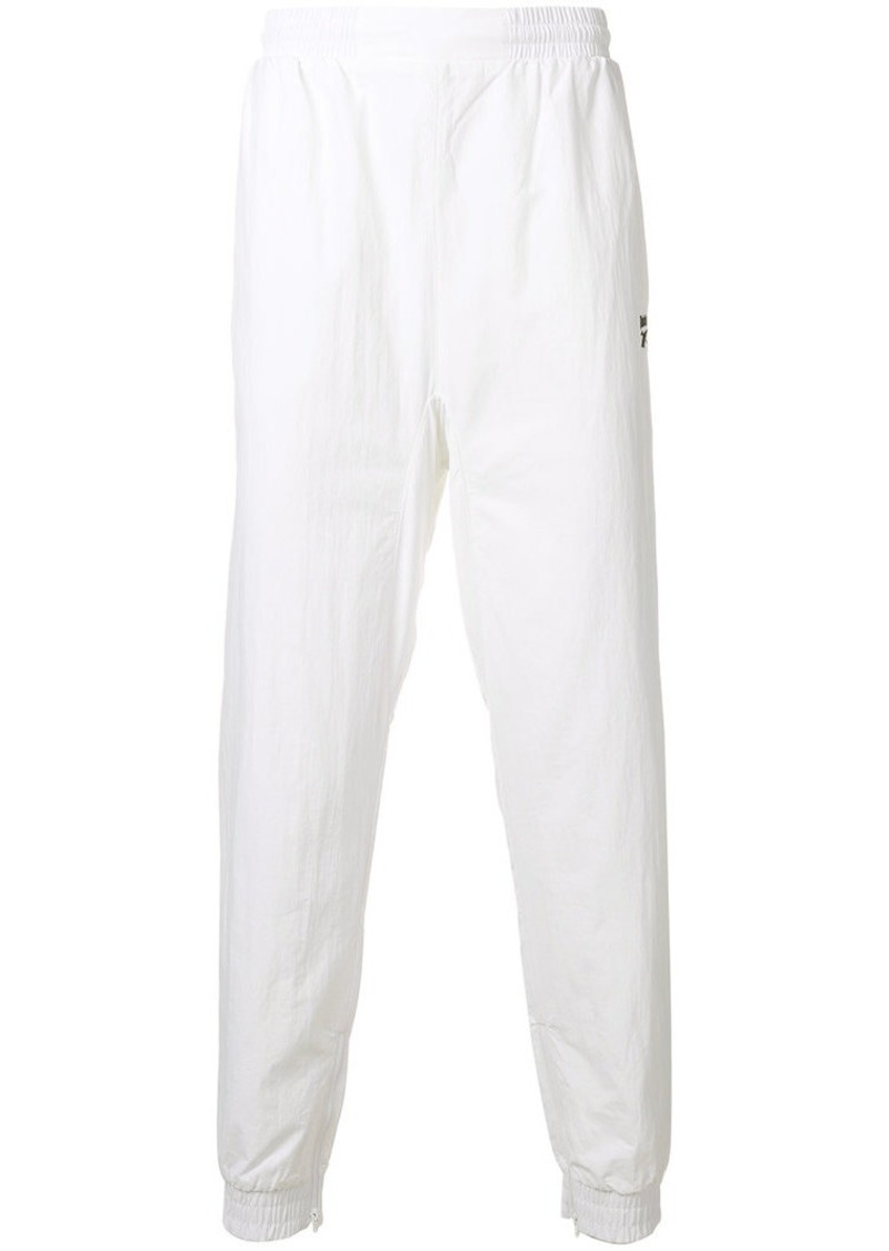800x1126 Reebok Vector Track Trousers Casual Pants
