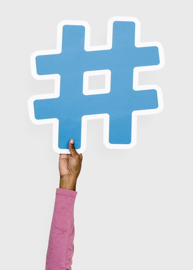 626x876 Hand Raised Holding Hashtag Icon Photo Free Download