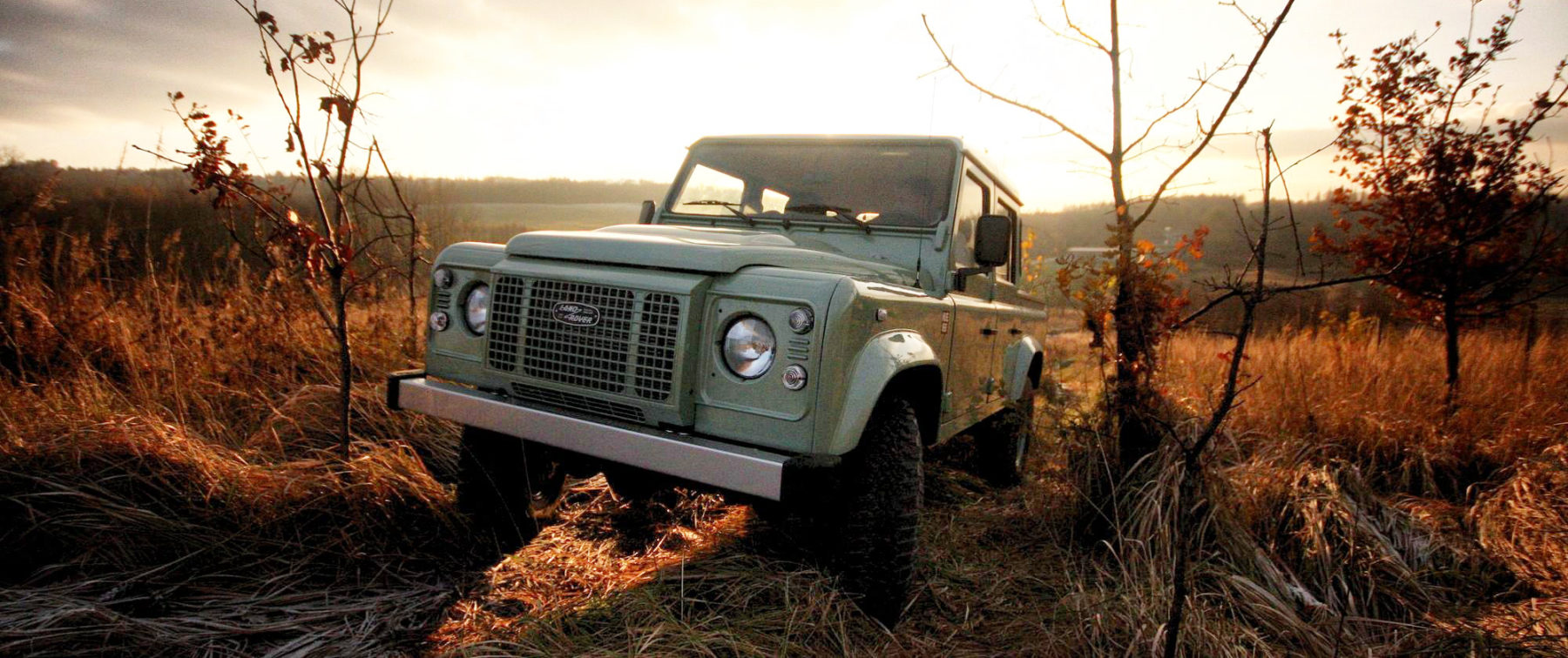 1800x756 Long Live The Land Rover Defender! The British Icon Rides