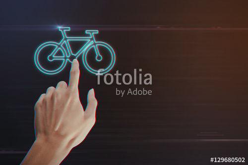 500x334 Human Hand Pressing Bicycle Icon On Light Motion Background