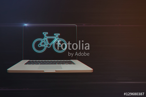500x334 Laptop With Bicycle Icon On Light Motion Background And Lens Flare
