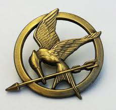 230x219 Mockingjay Pin The Hunger Games Wiki Fandom Powered