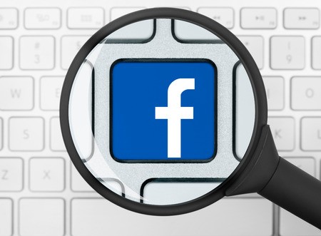 450x331 Facebook Icon Under The Magnifying Glass Royalty Free Images