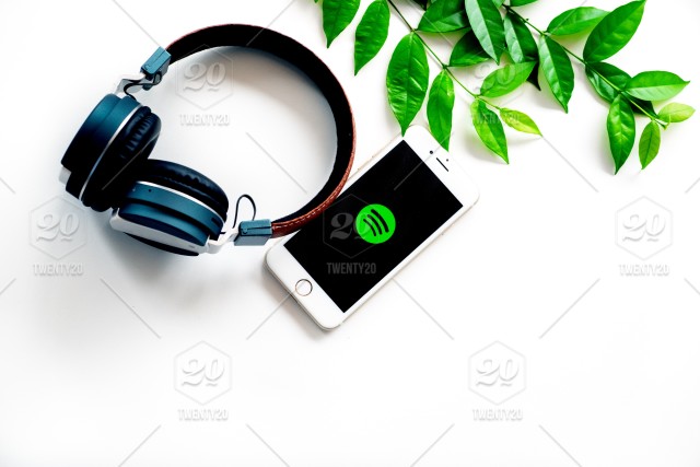 640x427 Flat Lay Of Headphone And Smart Phone Which Showing Spotify App