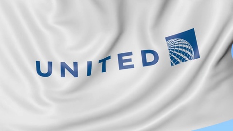 480x270 Waving Flag Of United Airlines Against Blue Sky Background
