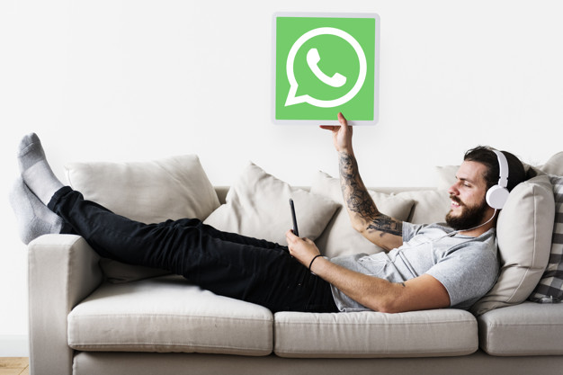 626x417 Man Showing A Whatsapp Messenger Icon Photo Free Download
